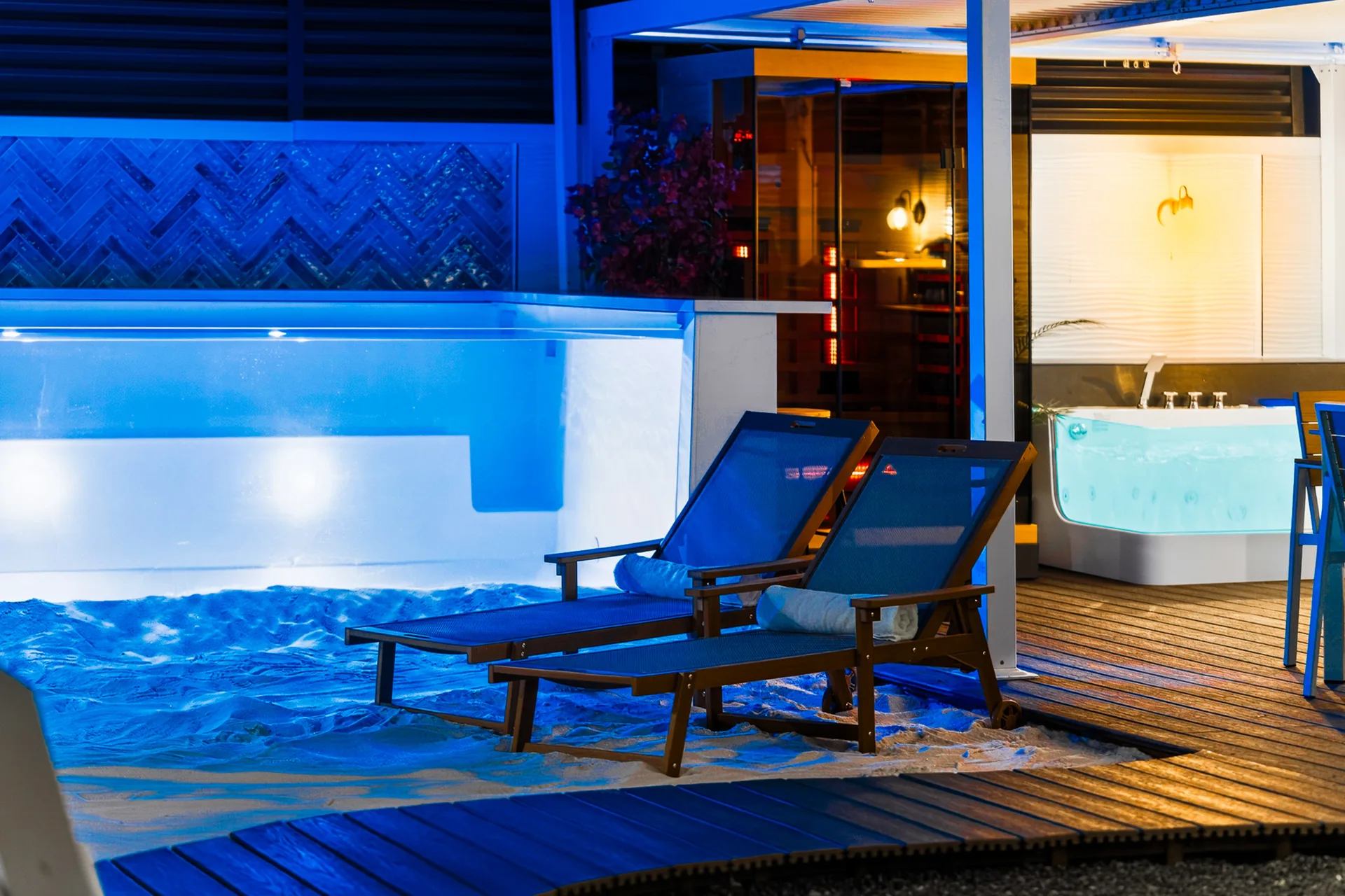 Private heated pool, jacuzzi and sauna at twilight